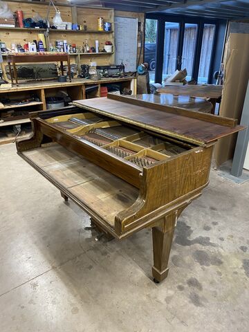 The old French polish finish on this Steinway grand was very tired