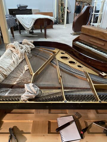 Using a string gauge to ascertain which piano wire to use for the treble section